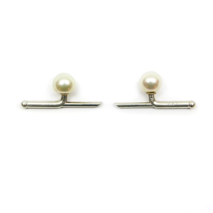 Pair of pearl dress studs by Cartier, Paris, the bouton pearls 2.63ct &amp; 2.50ct, | MasterArt